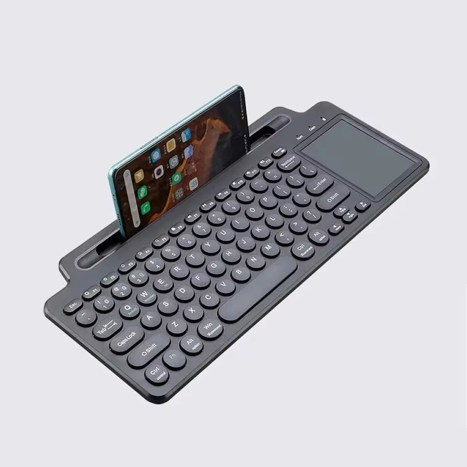 Upgrade your typing game with our 2.4G Wireless Bluetooth Keyboard featuring a touchpad and card slot – perfect for laptops, tablets, and gaming on Android, iOS, and iPad!