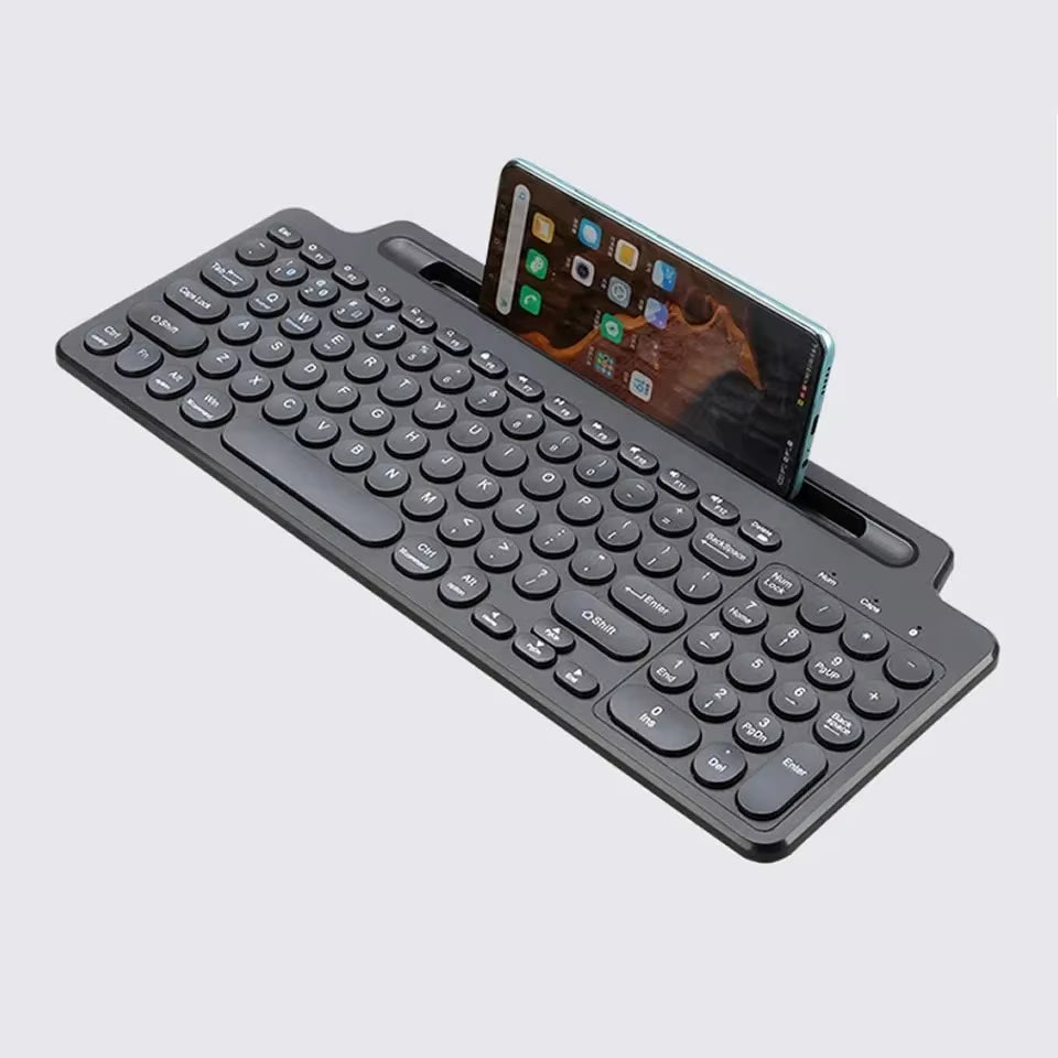 Upgrade your typing game with our 2.4G Wireless Bluetooth Keyboard featuring a touchpad and card slot – perfect for laptops, tablets, and gaming on Android, iOS, and iPad!
